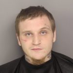 
              This photo provided by Greenville County Sheriff’s Office, shows Logan Alexander Holmes.  Police say an investigation into two brothers for a killing in South Carolina led to videos of them and others beating up at least five people at homeless camps in Greenville. Seth Norris is charged with attempted murder in the attacks, along with David Allen Norris, 21, and Logan Alexander Holmes, 20.  (Greenville County Sheriff’s Office via AP)
            