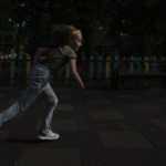 
              A girl runs in a playground in a park as air raids go off, in Kramatorsk, eastern Ukraine, Thursday, July 14, 2022. It’s well known that many of the residents of eastern Ukraine who refuse to heed authorities’ calls to flee are older ones. It’s jarring, then, to explore the streets of communities close to the front line and spot children. Unlike the adults who decide to stay, the children have their fate tied to the wishes of their parents. (AP Photo/Nariman El-Mofty)
            