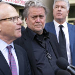 
              Former White House strategist Steve Bannon accompanied by his attorneys David Schoen, left and M. Evan Corcoran speaks with the media as he departs the federal court after a jury found him guilty on both counts in his contempt-of-Congress trial in Washington, Friday, July 22, 2022. Bannon was brought to trial on a pair of federal charges for criminal contempt of Congress after refusing to cooperate with the House committee investigating the U.S. Capitol insurrection on Jan. 6, 2021. (AP Photo/Jose Luis Magana)
            