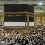 
              In this photo taken with low shutter speed, Muslim pilgrims circumambulate around the Kaaba, the cubic building at the Grand Mosque, in Mecca, Saudi Arabia, Wednesday, July 6, 2022. Muslim pilgrims are converging on Saudi Arabia's holy city of Mecca for the largest hajj since the coronavirus pandemic severely curtailed access to one of Islam's five pillars. (AP Photo/Amr Nabil)
            