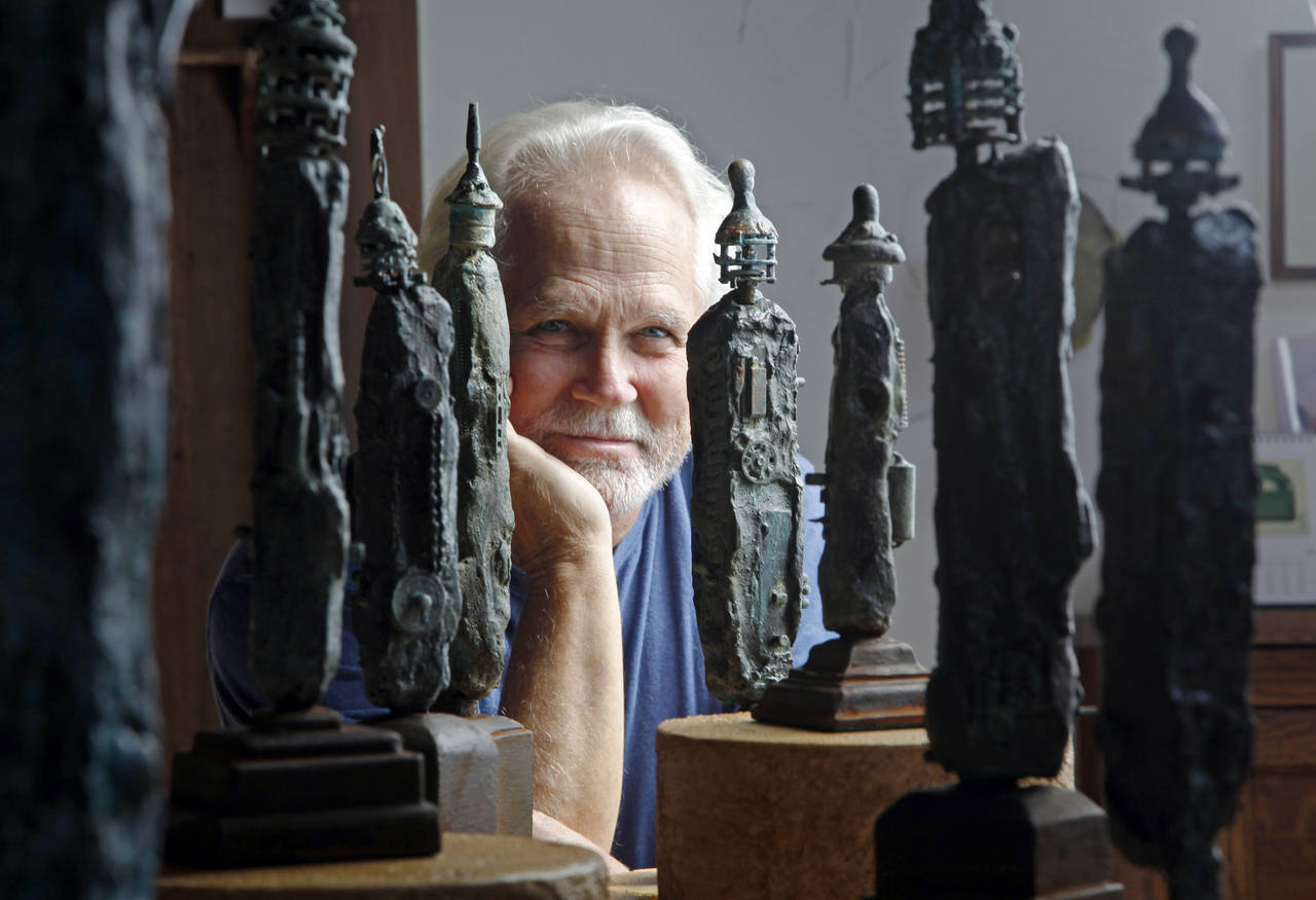 FILE - Tony Dow, actor, director and artist, poses with some of his works at his home and studio in...