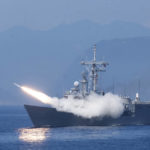 
              A Cheng Kung class frigate fires an anti air missile as part of a navy demonstration in Taiwan's annual Han Kuang exercises off the island's eastern coast near the city of Yilan, Taiwan on Tuesday, July 26, 2022. The Taiwanese capital Taipei staged a civil defense drill Monday and Tsai on Tuesday attended the annual Han Kuang military exercises, although there was no direct connection with tensions over a possible Pelosi visit. (AP Photo/Huizhong Wu)
            