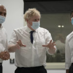 
              FILE - Britain's Prime Minister Boris Johnson, center, Rishi Sunak, Chancellor of the Exchequer, right, and Sajid Javid, Secretary of State for Health and Social Care speak together as they look at a CT scanner during a visit to the New Queen Elizabeth II Hospital, Welwyn Garden City, England, on April 6, 2022. Two of Britain’s most senior Cabinet ministers have quit, a move that could spell the end of Prime Minister Boris Johnson’s leadership after months of scandals. Treasury chief Rishi Sunak and Health Secretary Sajid Javid resigned within minutes of each other. (AP Photo/Frank Augstein, File
            