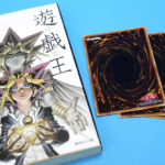 
              This photo shows “Yu-Gi-Oh!” manga comic and trading cards in Tokyo Thursday, July 7, 2022. Kazuki Takahashi, the creator of the “Yu-Gi-Oh!” manga comic and trading card game, has died, apparently while snorkeling in southwestern Japan, the coast guard said Friday, July 8, 2022. (Shohei Miyano/Kyodo News via AP)
            