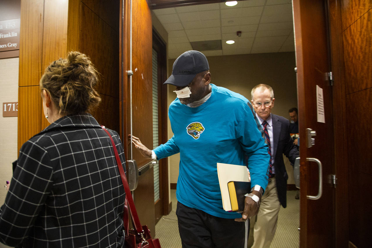 FILE - Former Houston police officer Gerald Goines, center, exits the 338th District Criminal Court...