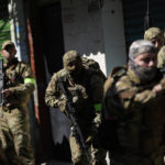 
              Police conduct an operation in the Complexo do Alemao favela in Rio de Janeiro, Brazil, Thursday, July 21, 2022. Multiple deaths were reported during the raid that was targeting a criminal group in Rio largest complex of favelas, or low-income communities, that stole vehicles, cargo and banks, as well as invaded nearby neighborhoods. (AP Photo/Silvia Izquierdo)
            