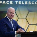 
              President Joe Biden listens during a briefing from NASA officials about the first images from the Webb Space Telescope, the highest-resolution images of the infrared universe ever captured, in the South Court Auditorium on the White House complex, Monday, July 11, 2022, in Washington. (AP Photo/Evan Vucci)
            