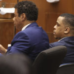 
              Defendant Eric Holder, right, and his attorney Aaron Jansen listen during opening statements in Holder's murder trial, Wednesday, June 15, 2022, at Los Angeles Superior Court in Los Angeles. Holder, 32, faces one count of first degree-murder and two counts of attempted first-degree murder for the killing the Grammy Award-winning rapper Nipsey Hussle outside his clothing store three years ago. (Frederick M. Brown/Daily Mail.com via AP, Pool)
            