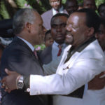 
              CAPTION CORRECTS AGE - FILE - Angolan President Jose Eduardo dos Santos, left, embraces rebel UNITA leader Jonas Savimbi after a peace summit in Lusaka, Zambia, Saturday, May 6, 1995. Former Angolan president Jose Eduardo dos Santos has died in a clinic in Barcelona, Spain after an illness, the Angolan government said. He was 79 years old and died following a long illness, the government said Friday, July 8, 2022 in an announcement on its Facebook page. (AP Photo/John Moore, File)
            