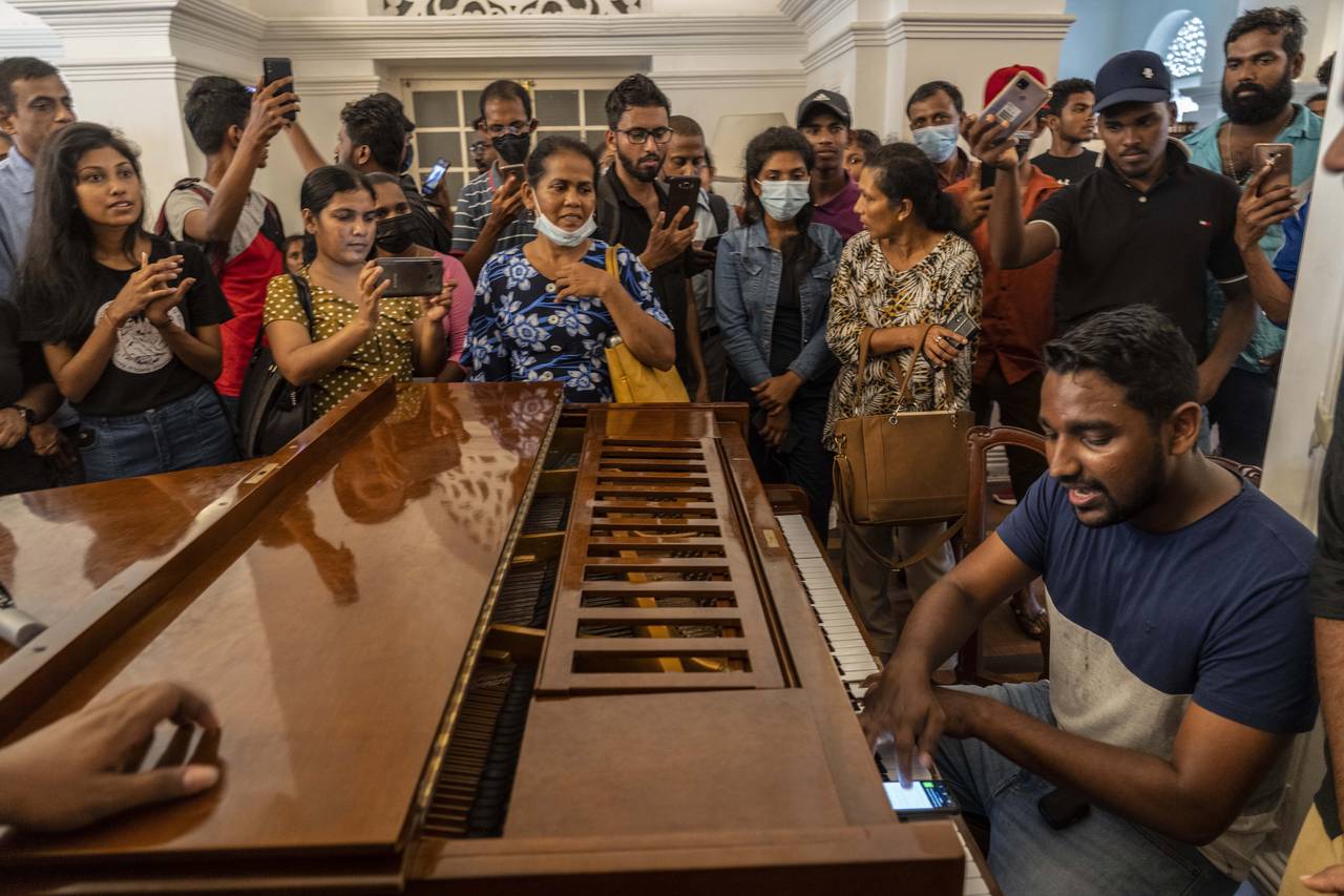 A man plays piano at the prime minister's official residence on the second day after it was it was ...