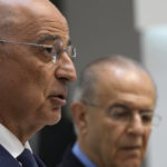 
              Cyprus' Foreign Minister Ioannis Kasoulides, right, and his Greek counterpart Nikos Dendia talk to the media during a press conference after their meeting at the Foreign Ministry house in Nicosia, Cyprus, Thursday, July 28, 2022. Dendias is in Cyprus for official visit. (AP Photo/Petros Karadjias)
            
