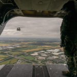 
              A Boeing H-47 Chinook helicopter transports new recruits of the Ukrainian army being trained by UK military specialists to the training camp, near Manchester, England, Thursday, July 7, 2022. (Louis Wood/Pool Photo via AP)
            