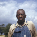 
              This 1950's photo made available by the National Archives shows a man included in a syphilis study in Alabama. For 40 years starting in 1932, medical workers in the segregated South withheld treatment for Black men who were unaware they had syphilis, so doctors could track the ravages of the illness and dissect their bodies afterward. (National Archives via AP)
            