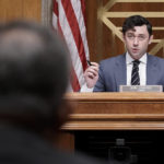 
              Chairman Jon Ossoff, D-Ga., questions Michael Carvajal, the outgoing director of the Federal Bureau of Prisons, as the Senate Permanent Subcommittee On Investigations holds a hearing on charges of corruption and misconduct at the U.S. Penitentiary in Atlanta, at the Capitol in Washington, Tuesday, July 26, 2022. (AP Photo/J. Scott Applewhite)
            