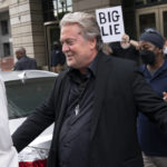 
              Steve Bannon departs the federal court in Washington, Thursday, July 21, 2022. Bannon was brought to trial on a pair of federal charges for criminal contempt of Congress after refusing to cooperate with the House committee investigating the U.S. Capitol insurrection on Jan. 6, 2021. (AP Photo/Jose Luis Magana)
            