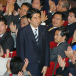 
              FILE - Shinzo Abe acknowledges applause from the Liberal Democratic Party (LDP) lawmakers as he won a landslide victory Wednesday, Sept. 20, 2006 in Japan's ruling party presidential vote at the LDP headquarters in Tokyo. Former Japanese Prime Minister Abe, a divisive arch-conservative and one of his nation's most powerful and influential figures, has died after being shot during a campaign speech Friday, July 8, 2022, in western Japan, hospital officials said. (AP Photo/Koji Sasahara, File)
            