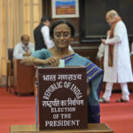 
              A lawmaker casts her vote during India's president election at the Parliament House in New Delhi, Monday, July 18, 2022. Lawmakers are voting for India's next president in an election expected to be won by a tribal woman from India's ruling party. The election of Draupadi Murmu is a formality as the Bharatiya Janata Party controls enough seats in federal and state legislatures to push its favored candidate. (AP Photo/Manish Swarup)
            