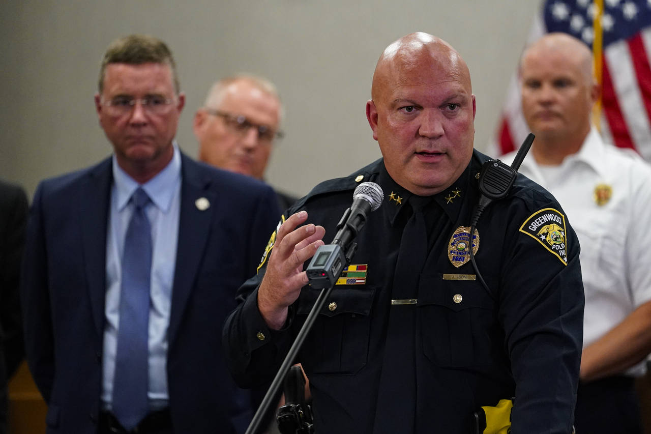 Greenwood Police Chief James Ison speak during a press conference at the Greenwood City Center in G...