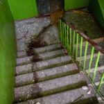 
              FILE - Blood stains mark a stairwell inside a building damaged in an overnight missile strike in Slovyansk, Ukraine, Tuesday, May 31, 2022. (AP Photo/Francisco Seco)
            