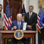 
              President Joe Biden signs an executive order on abortion access during an event in the Roosevelt Room of the White House, Friday, July 8, 2022, in Washington. From left, Vice President Kamala Harris, Health and Human Services Secretary Xavier Becerra, and Deputy Attorney General Lisa Monaco look on. (AP Photo/Evan Vucci)
            