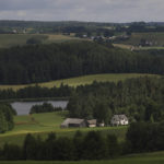 
              A general view is pictured from the top of the Cisowa mountain, about 10 km from Polish-Lithuanian border in Gulbieniszki, Poland, Thursday, July 7, 2022.  The Suwalki gap, which stretches about 100 kilometres along the Lithuanian-Polish border and lies sandwiched between Belarus and the Russian exclave of Kaliningrad, has long been regarded as a vulnerable point in Nato's defences, if a conflict breaks out with Russia. The presidents of NATO members Poland, Andrzej Duda, and Lithuania, Gitanas Nauseda, voiced confidence Thursday that allied troops can fully safeguard a strategically vital corridor, which links their countries, between Russian ally Belarus and a Russian Baltic Sea exclave. (AP Photo/Michal Dyjuk)
            