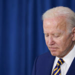 
              FILE - President Joe Biden pauses as he answers a reporter's question about Ukraine after speaking about the May jobs report, June 3, 2022, in Rehoboth Beach, Del. Biden is having trouble fulfilling his promises to the rest of the world because of political challenges at home. Although he's made pledges or reached deals on climate change, taxes and pandemic relief, legislation for all of those issues has stalled on Capitol Hill.  (AP Photo/Patrick Semansky, File)
            