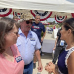 
              Former United Nations Ambassador Nikki Haley talks with Bob and Kathy de Koning, a farming couple from Sioux County, Iowa, Thursday, June 30, 2022, after headlining a fundraiser in northwest Iowa for Republican Rep. Randy Feenstra. (AP Photo/Tom Beaumont)
            