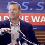 
              FILE - Former Kansas Secretary of State Kris Kobach speaks in Leavenworth, Kan., on July 8, 2019. Kansas voters have said no to Kobach twice over the past four years., but the immigration hard-liner is pursuing a political comeback. Kobach is running for Kansas attorney general after losing a general election for governor in 2018 and a Republican primary for the U.S. Senate in 2020. (AP Photo/Charlie Riedel, File)
            