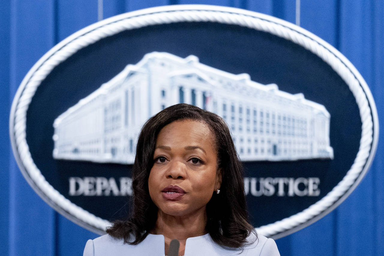 FILE - Assistant Attorney General for Civil Rights Kristen Clarke speaks at a news conference at th...