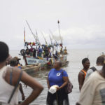 
              Fishmongers from Limbe, Cameroon, and neighboring communities wait at the shore for fishing boats to arrive with their catch at the shore on Limbe, on April 12, 2022. In recent years, Cameroon has emerged as one of several go-to countries for the widely criticized “flags of convenience” system, under which foreign companies can register their ships even though there is no link between the vessel and the nation whose flag it flies. But experts say weak oversight and enforcement of fishing fleets undermines global attempts to sustainably manage fisheries and threatens the livelihoods of millions of people in regions like West Africa. (AP Photo/Grace Ekpu)
            