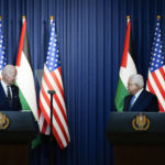 
              U.S. President Joe Biden listens as Palestinian President Mahmoud Abbas speaks during a joint statement at the West Bank town of Bethlehem, Friday, July 15, 2022. (AP Photo/Majdi Mohammed)
            