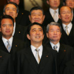 
              FILE - Then Newly-appointed Japanese Prime Minister Shinzo Abe, front row center, poses with his Cabinet members for the official group photo at the prime minister's official residence in Tokyo Tuesday, Sept. 26, 2006. Former Japanese Prime Minister Abe, a divisive arch-conservative and one of his nation's most powerful and influential figures, has died after being shot during a campaign speech Friday, July 8, 2022, in western Japan, hospital officials said.(AP Photo/Koji Sasahara, File)
            