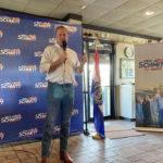 
              Missouri’s Republican Attorney General and U.S. Senate candidate Eric Schmitt speaks at a campaign rally at a bar, Wednesday, July 27, 2022 in Columbia, Mo. (AP Photo/Summer Ballentine)
            