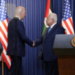 
              U.S. President Joe Biden and Palestinian President Mahmoud Abbas shake hands after a joint statement at the West Bank town of Bethlehem, Friday, July 15, 2022.(AP Photo/Evan Vucci)
            