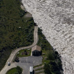 
              FILE - A road ends where floodwaters washed away a house in Gardiner, Mont., on June 16, 2022. As cleanup from historic floods at Yellowstone National Park grinds on, climate experts and meteorologists say the gap between the destruction in the area and what was forecast underscores a troublesome trend tied to climate change: Modeling programs used to predict storms aren't keeping up with increasingly extreme weather. (AP Photo/David Goldman, File)
            