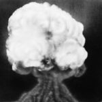 
              FILE - This is the mushroom cloud of the first atomic explosion at Trinity Test Site, New Mexico, July 16, 1945. By ending 77 years of almost uninterrupted peace in Europe, war in Ukraine war has joined the dawn of the nuclear age and the birth of manned spaceflight as a watershed in history. After nearly a half-year of fighting, tens of thousands of dead and wounded on both sides, massive disruptions to supplies of energy, food and financial stability, the world is no longer as it was. (AP Photo)
            