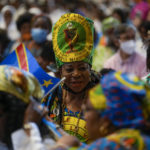 
              Faithful wait for the arrival of Pope Francis to celebrate a mass for the Congolese community, in St. Peter's Basilica at the Vatican, Sunday, July 3, 2022. (AP Photo/Andrew Medichini)
            