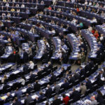
              European lawmakers gather to vote at the European Parliament, Wednesday, July 6, 2022 in Strasbourg, eastern France. European Union lawmakers back plan to include natural gas, nuclear energy as sustainable activities(AP Photo/Jean-Francois Badias)
            