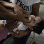 
              A toddler is inoculated for polio during a free vaccination campaign for polio, rubella and influenza organized by the Health Ministry in Caracas, Venezuela, Saturday, June 18, 2022. An Associated Press analysis of rare government data and estimates from public health agencies shows that Venezuela’s vaccination crisis is growing, putting it among the world’s worst countries for getting required shots that protect young children against potentially fatal diseases. (AP Photo/Ariana Cubillos)
            