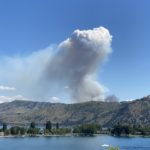 The Stayman Flats Fire burns in the distance with the south end of Lake Chelan in the foreground (Travis Mayfield) 
