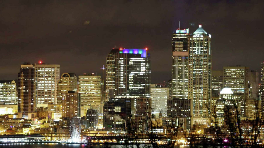 Lights on a downtown Seattle building form a giant figure "12" in honor of Seattle Seahawks fans an...