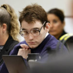 
              Marjory Stoneman Douglas High School shooter Nikolas Cruz is shown at the defense table during the penalty phase of Cruz's trial at the Broward County Courthouse in Fort Lauderdale on Wednesday, Aug. 24, 2022. Cruz previously plead guilty to all 17 counts of premeditated murder and 17 counts of attempted murder in the 2018 shootings. (Amy Beth Bennett/South Florida Sun Sentinel via AP, Pool)
            