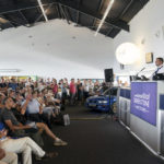 
              A packed auction room to see the Ford Escort RS Turbo Series 1, previously owned by Diana, Princess of Wales, on display at the Silverstone Race Circuit near Towcester, Northamptonshire, England, before it goes under the hammer on Saturday at Silverstone Classics, Saturday Aug. 27, 2022. (Joe Giddens/PA via AP)
            
