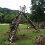 
              Debris gathers atop a slide in a children's play area after massive flooding on Friday, Aug. 5, 2022, near Haddix, Ky. (AP Photo/Brynn Anderson)
            