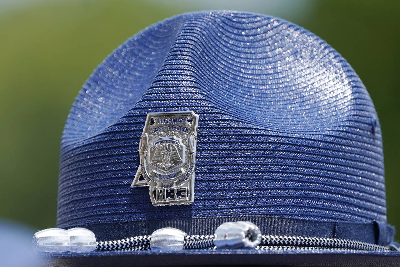 FILE - The emblem of a Mississippi Highway Patrol badge on a "cover," the hat worn by uniformed off...