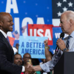 
              President Joe Biden, right, greets Maryland Democratic gubernatorial candidate Wes Moore during a rally for the Democratic National Committee at Richard Montgomery High School, Thursday, Aug. 25, 2022, in Rockville, Md. (AP Photo/Alex Brandon)
            