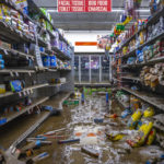 
              Damage from flooding is visible at Isom IGA in Isom, Ky., on Monday, Aug. 1, 2022. The grocery store was ravaged by historic floods last week, and the store's inventory was spoiled by the flood waters. (Ryan C. Hermens/Lexington Herald-Leader via AP)
            