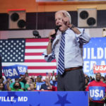 
              President Joe Biden speaks during a rally hosted by the Democratic National Committee at Richard Montgomery High School, Thursday, Aug. 25, 2022, in Rockville, Md. (AP Photo/Evan Vucci)
            