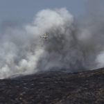 
              Clouds of smoke rise during a wildfire near Altura, eastern Spain, on Friday, Aug. 19, 2022. Up to early August, 43 large wildfires — those affecting at least 500 hectares (1,235 acres) — were recorded in the Mediterranean country by the Ministry for Ecological transition, while the average in previous years was 11. The European Forest Fire Information System estimates a burned surface of 284,764 hectares (704,000 acres) in Spain this year. That's four times higher than the average since records began in 2006. (AP Photo/Alberto Saiz)
            