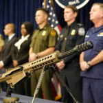 
              A Barrett 50 caliber rifle is displayed during a news conference at the Homeland Security Investigations Miami Field Office (HSI), Wednesday, Aug. 17, 2022, in Miami. HSI is working with other agencies to highlight efforts to crack down on a recent increase of firearms and ammunition smuggling to Haiti and other Caribbean nations. (AP Photo/Lynne Sladky)
            